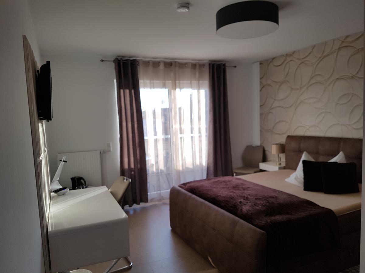 Aparthotel Magnolia Oberursel Bagian luar foto